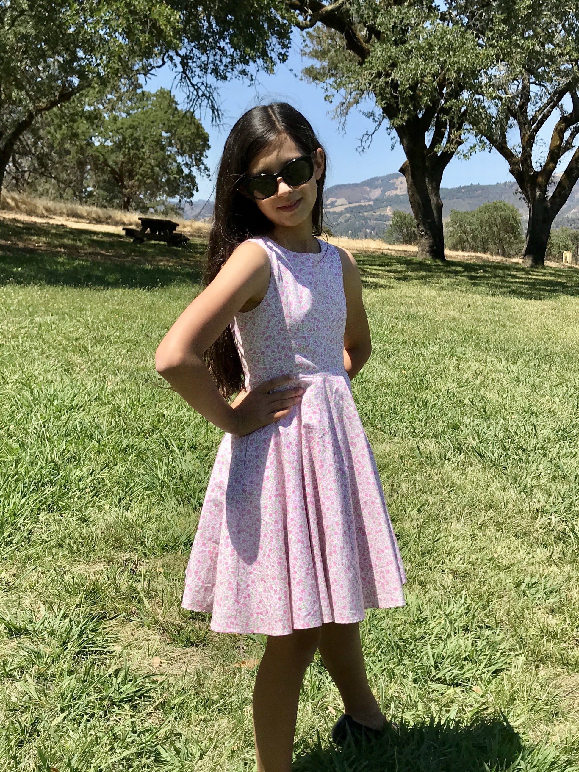 Jackie Dress in Pink Flowers is a classic fit and flare with pockets Classic Girl Jackie Dress in Pink Flowers is a classic fit and flare with pockets Classic Girl
